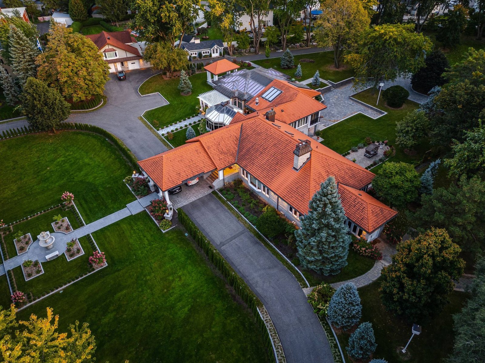 Aerial view of a luxury Florida estate at dusk